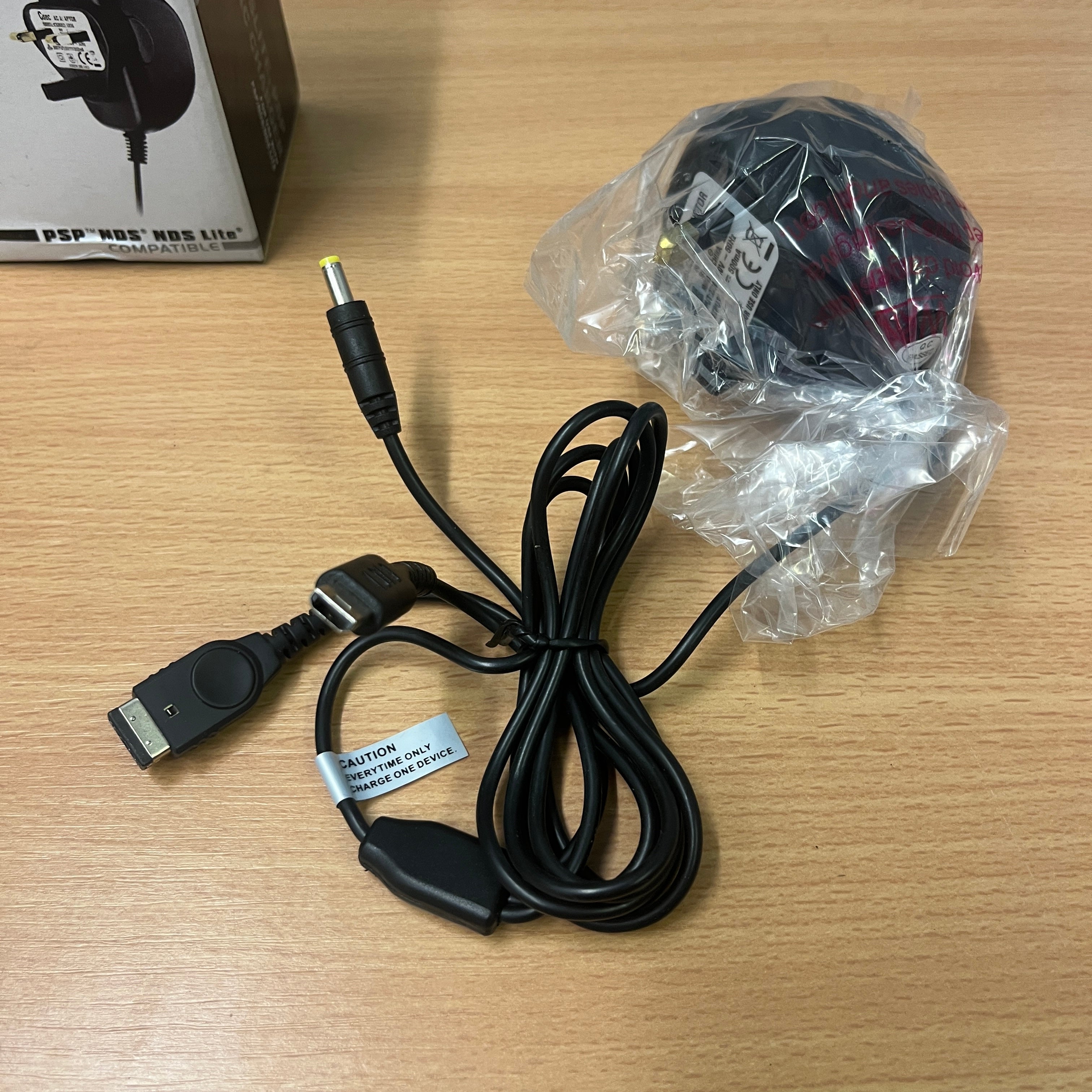 Multi Charger for Sony PSP, Nintendo DS, DS Lite, GBA SP handheld Consoles Multi Charger for Sony PSP, Nintendo DS, DS Lite, GBA SP handheld Consoles